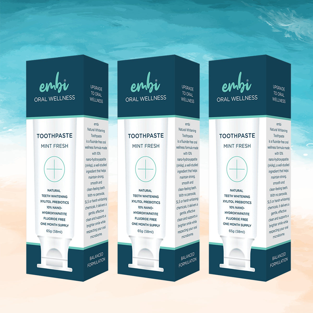 embi toothpaste 3 pack on a beach theme background 