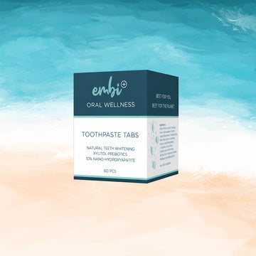 picture of embi toothpaste tablets on a beach theme 